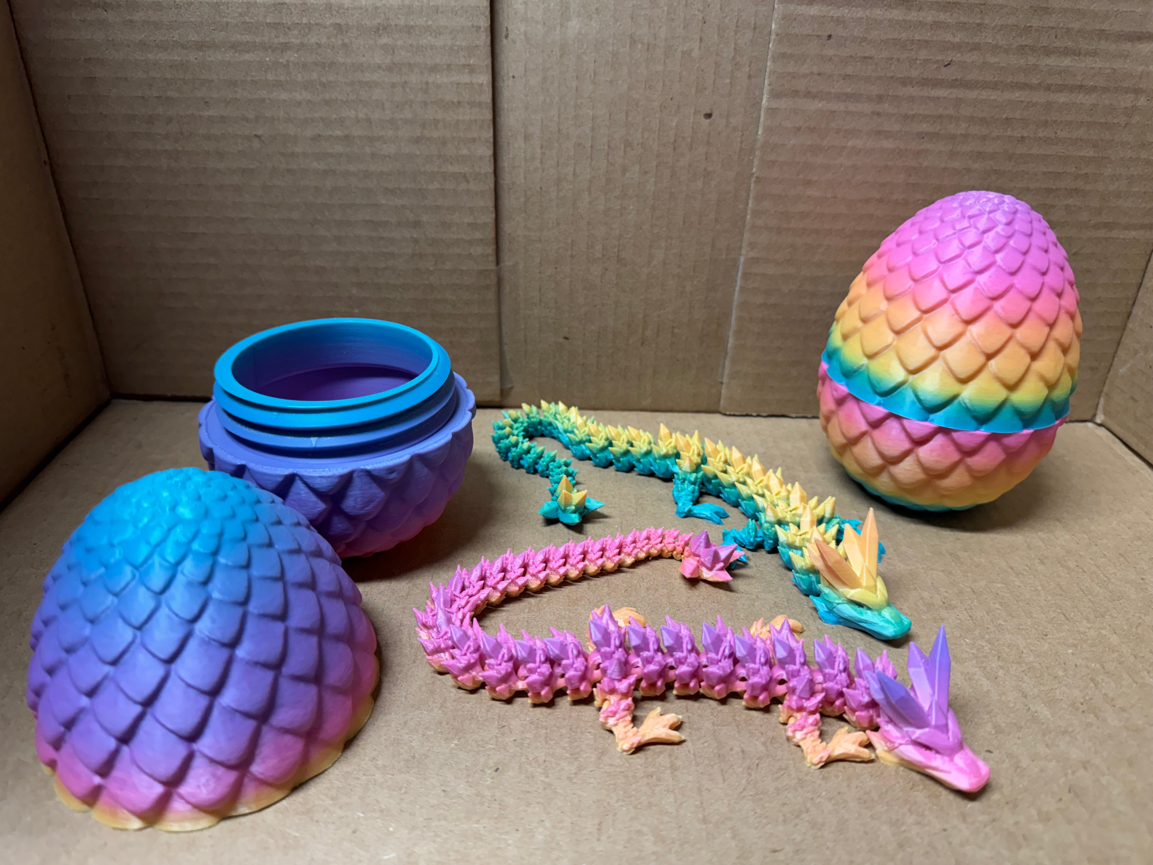 3D Printed Dragon Egg with Articulated Dragon Inside – Rainbow PLA